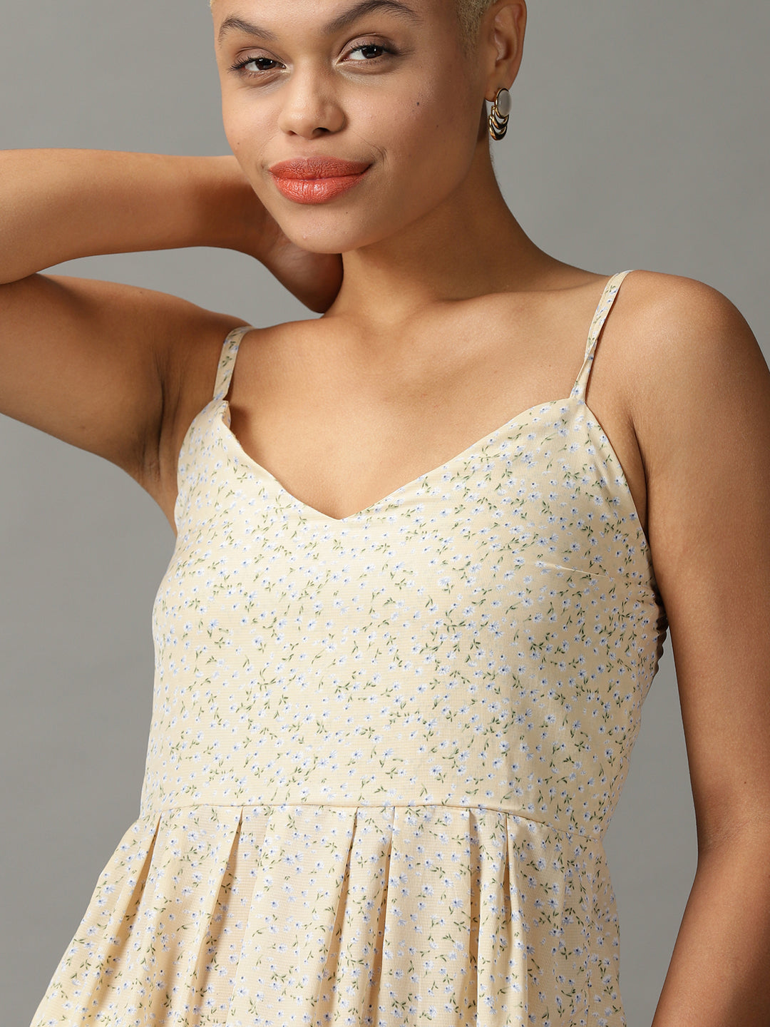 Women's Yellow Printed Peplum Top