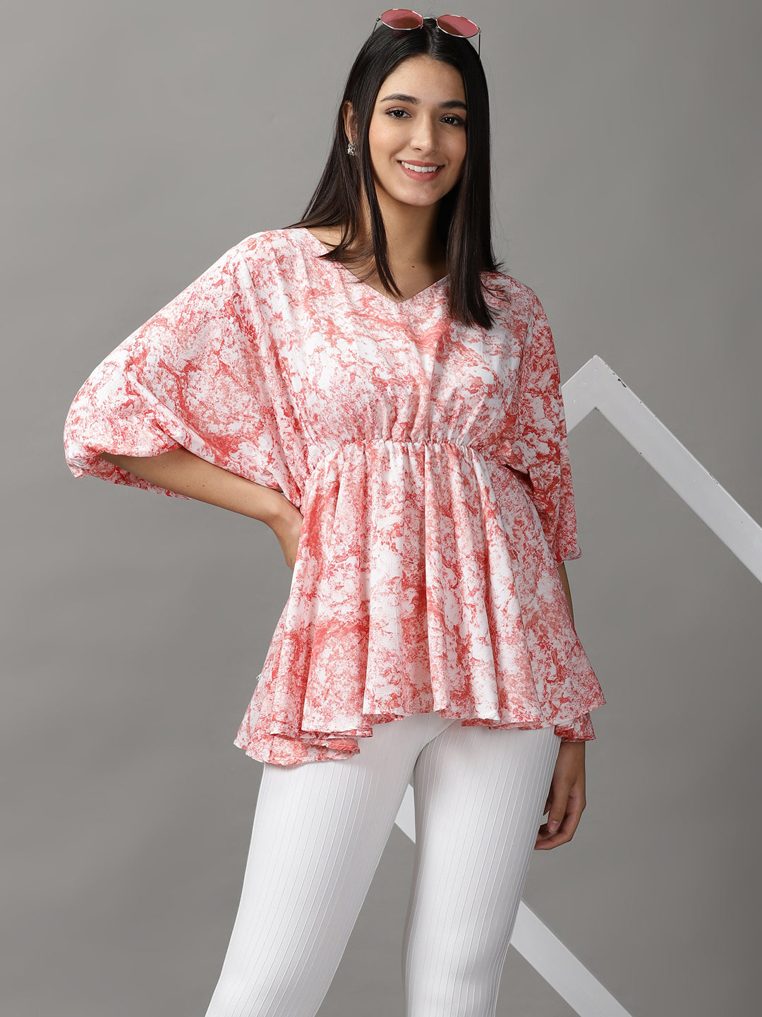 Women's Orange Printed Peplum Top