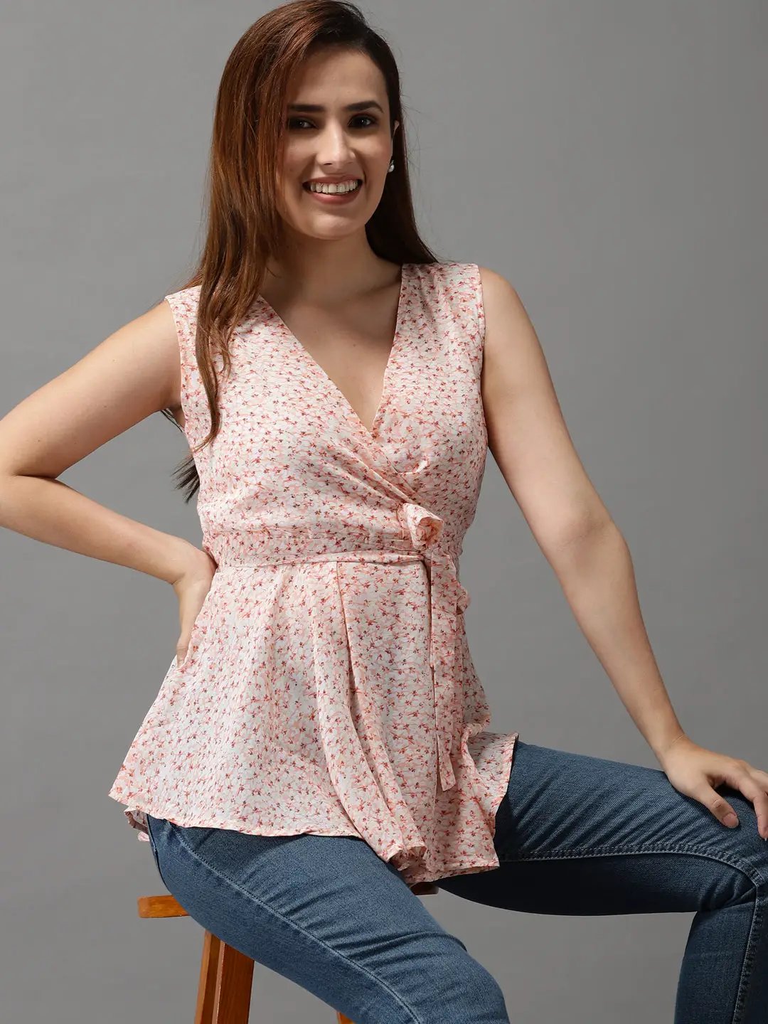 Women's Peach Printed Peplum Top