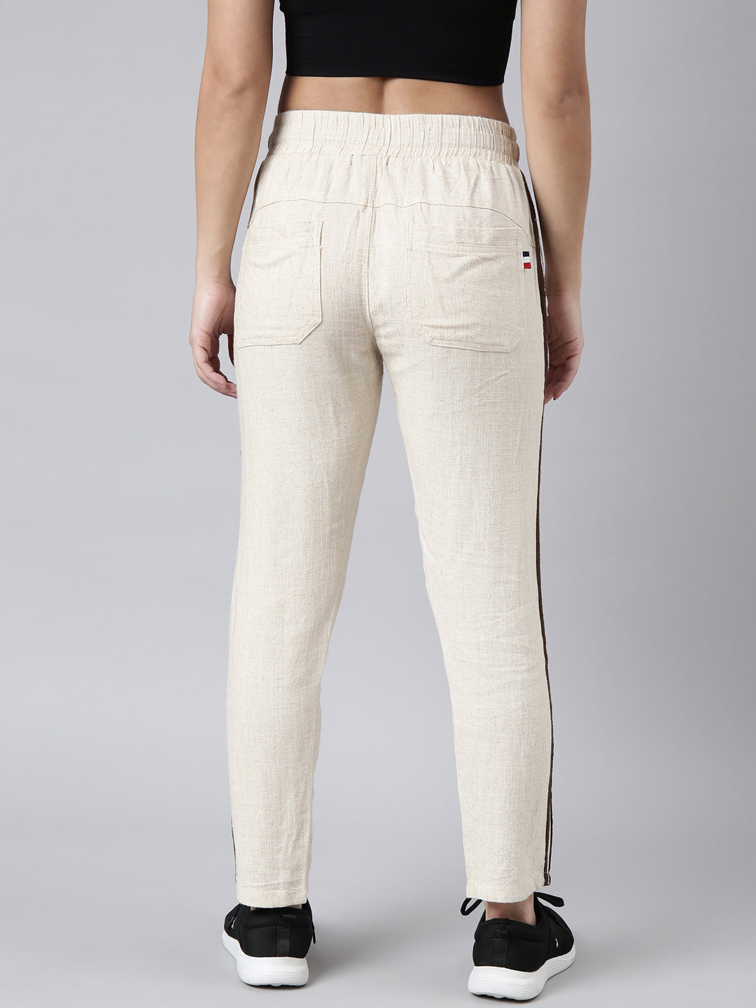 Women Solid Slim Fit Cream Track Pant