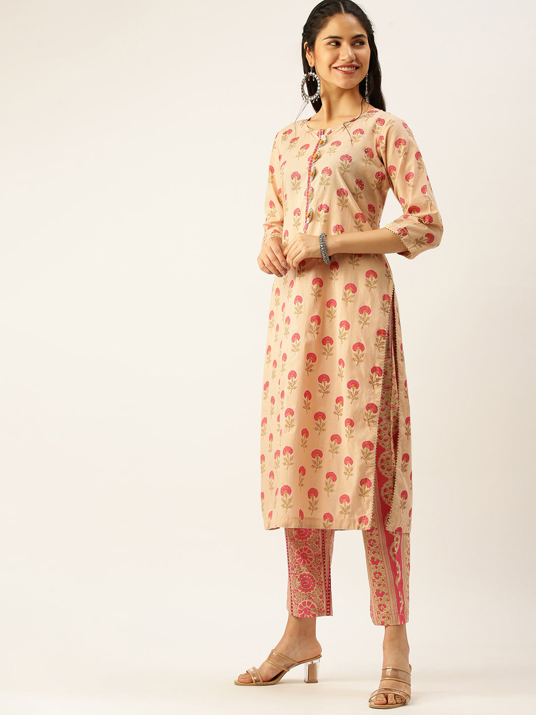 Women's Peach Printed Kurta Sets