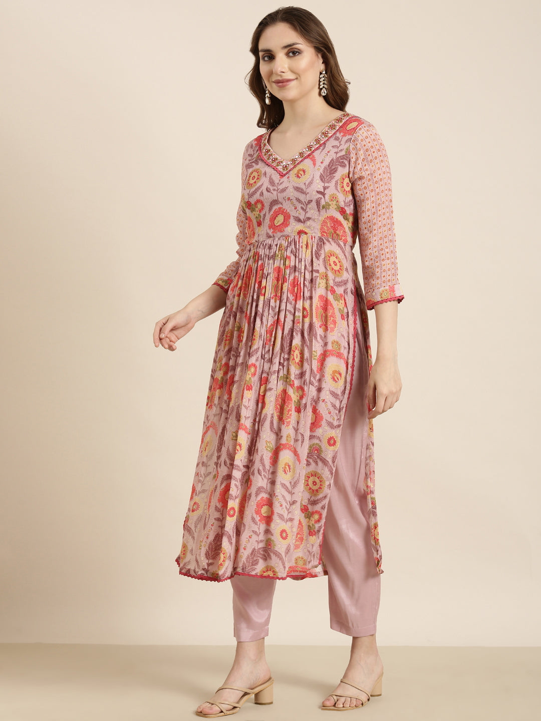 Women Anarkali Peach Ethnic Motifs Kurta and Trousers Set Comes With Dupatta