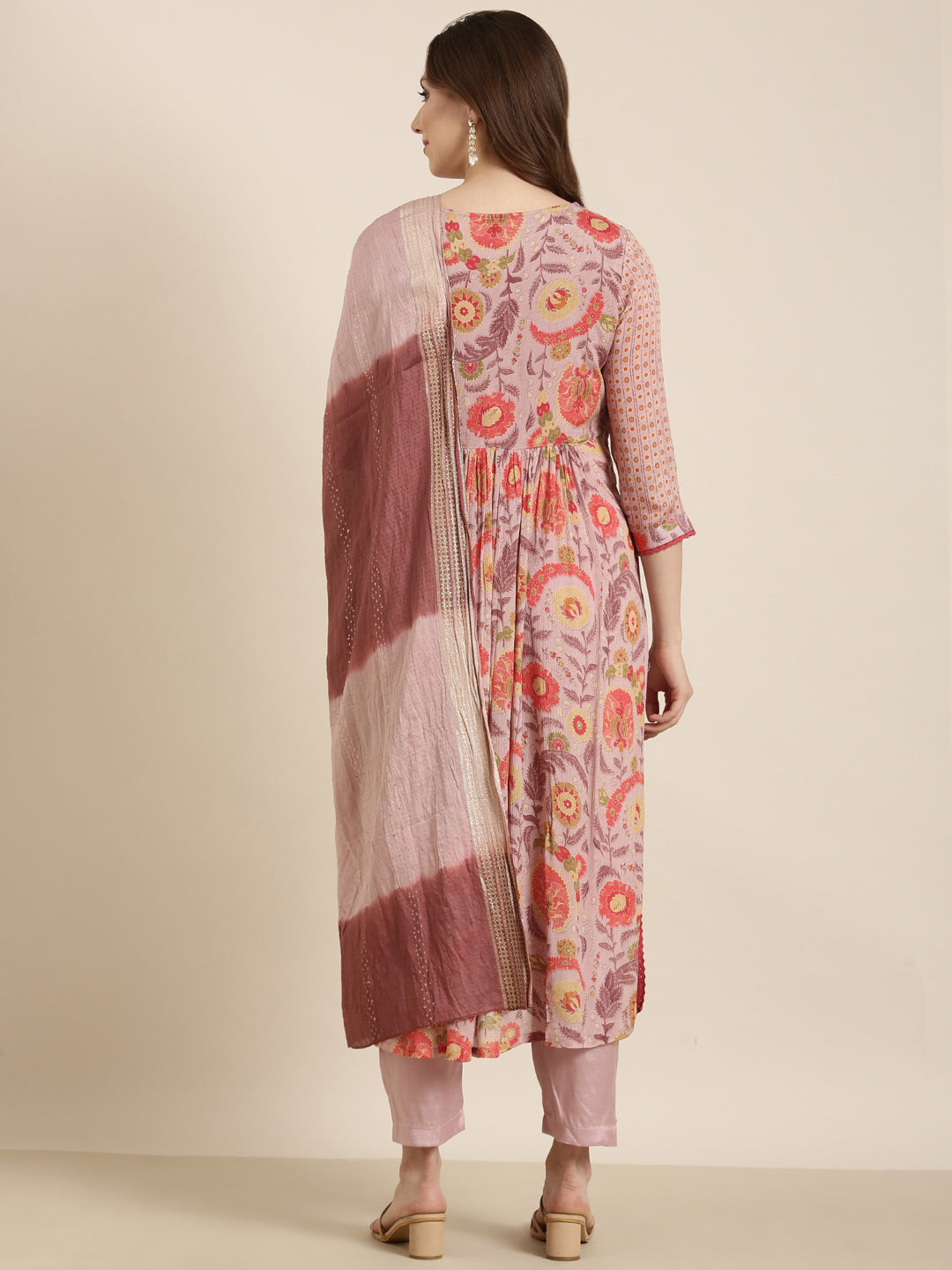 Women Anarkali Peach Ethnic Motifs Kurta and Trousers Set Comes With Dupatta