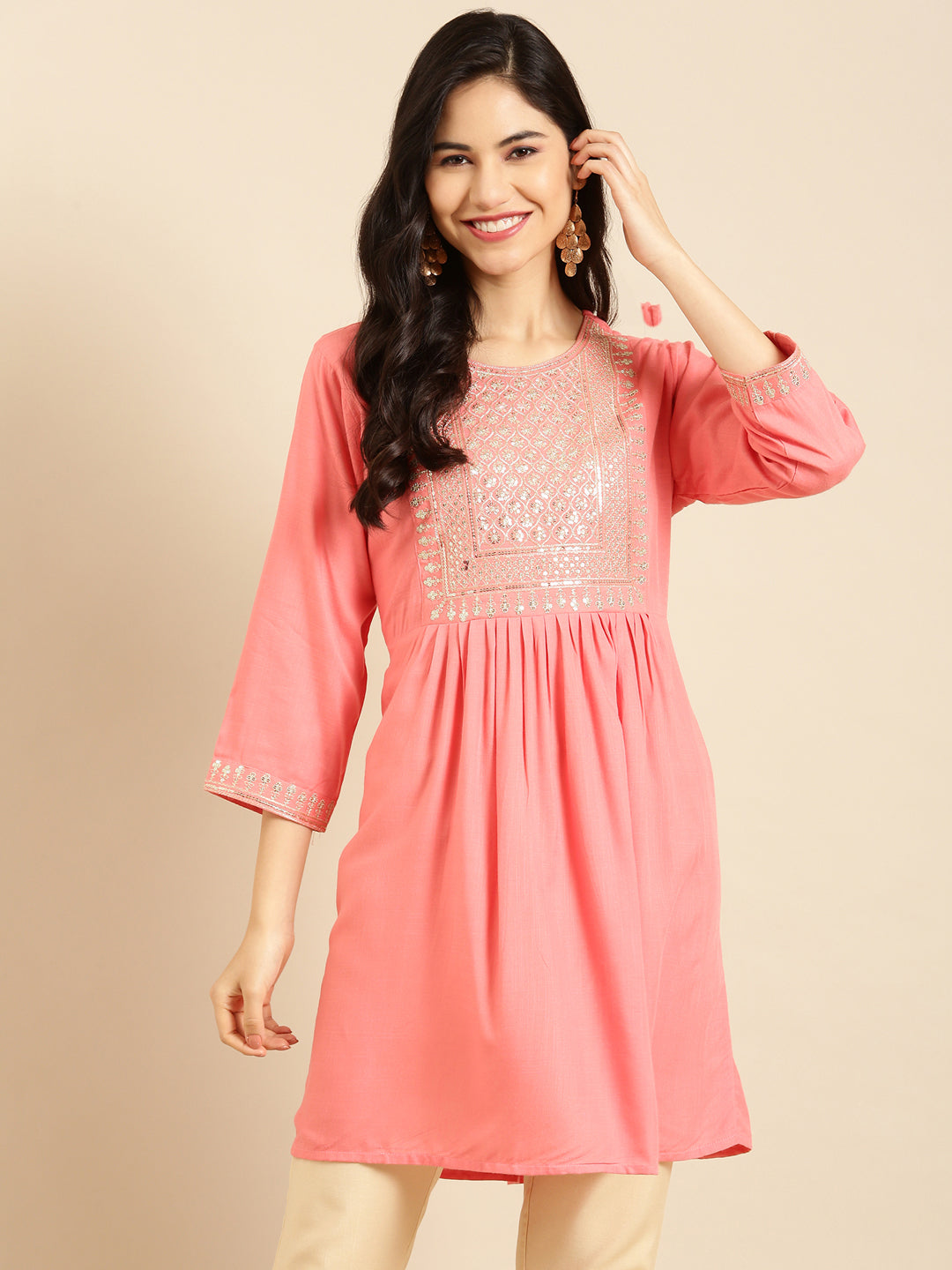 Women's Pink Solid Straight Kurti