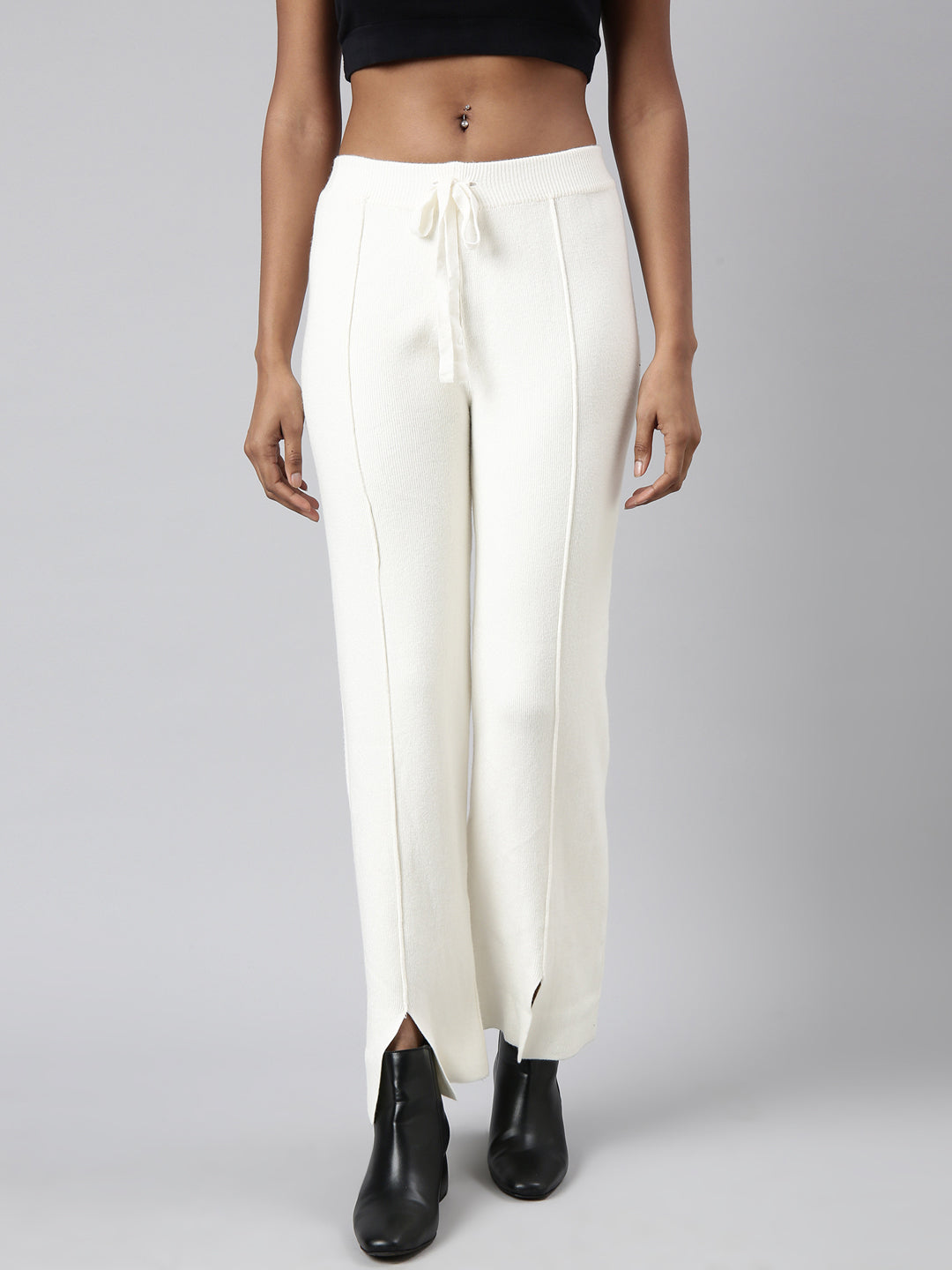 Women Solid Cream Parallel Trousers