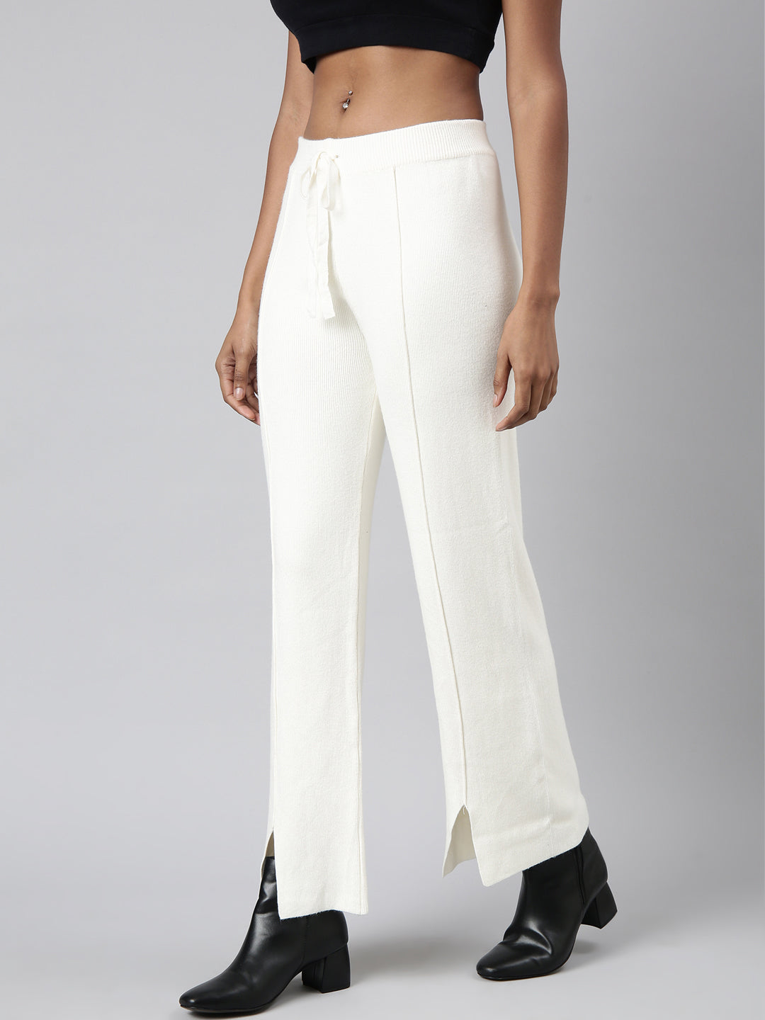 Women Solid Cream Parallel Trousers