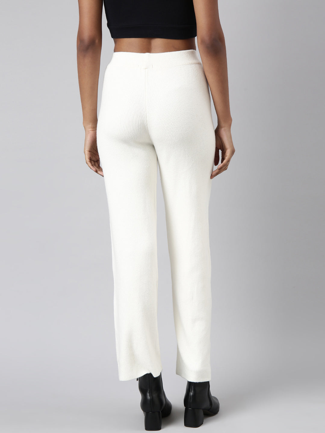 Women Solid Cream Parallel Trousers