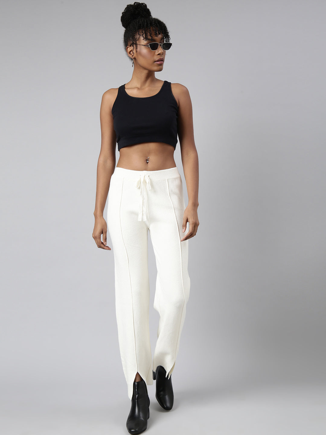 Women Solid Cream Parallel Trousers