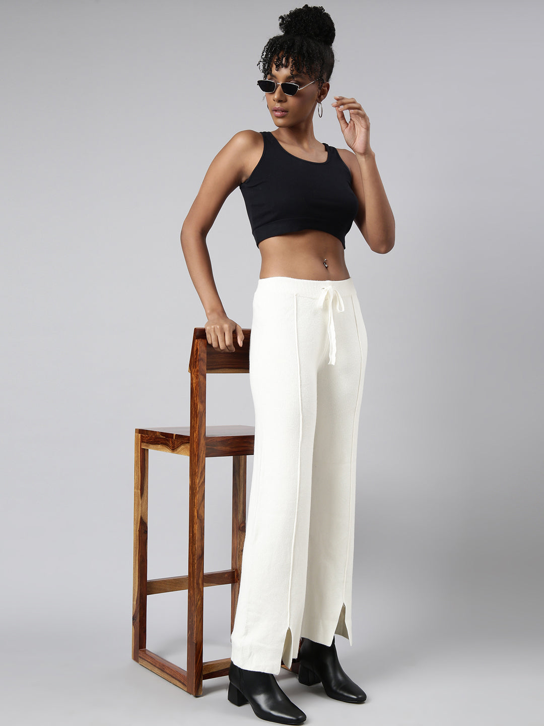 Women Solid Cream Parallel Trousers