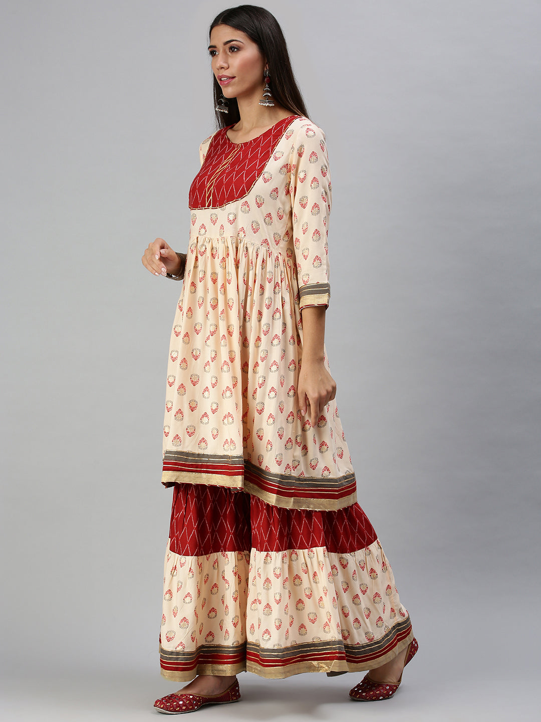 Women's Peach Printed Kurta Sets