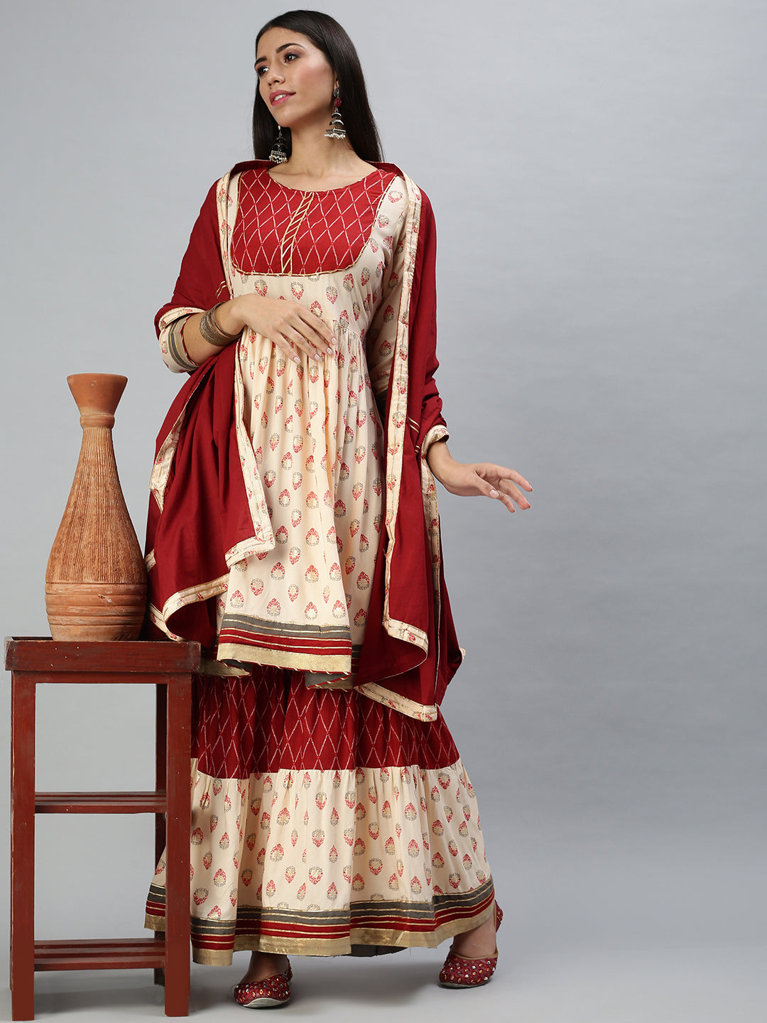 Women's Peach Printed Kurta Sets