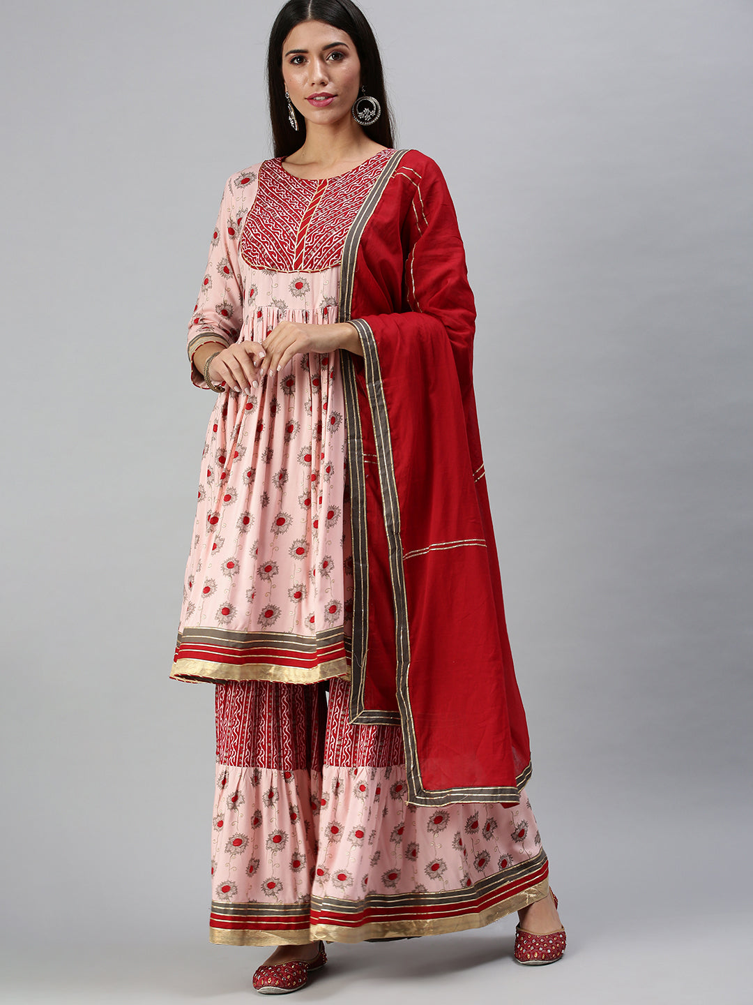 Women's Peach Printed Kurta Sets