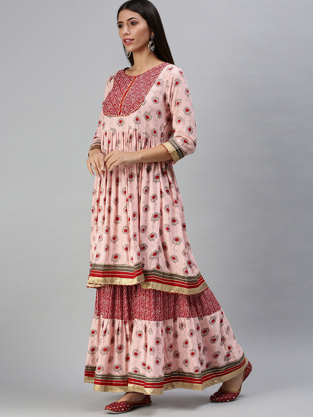 Women's Peach Printed Kurta Sets