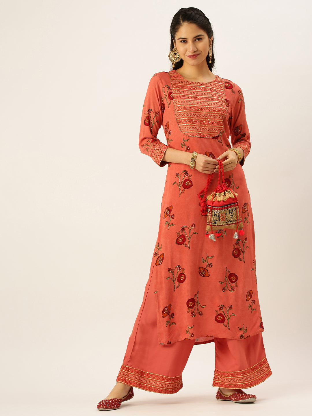 Women's Orange Printed Kurta Sets