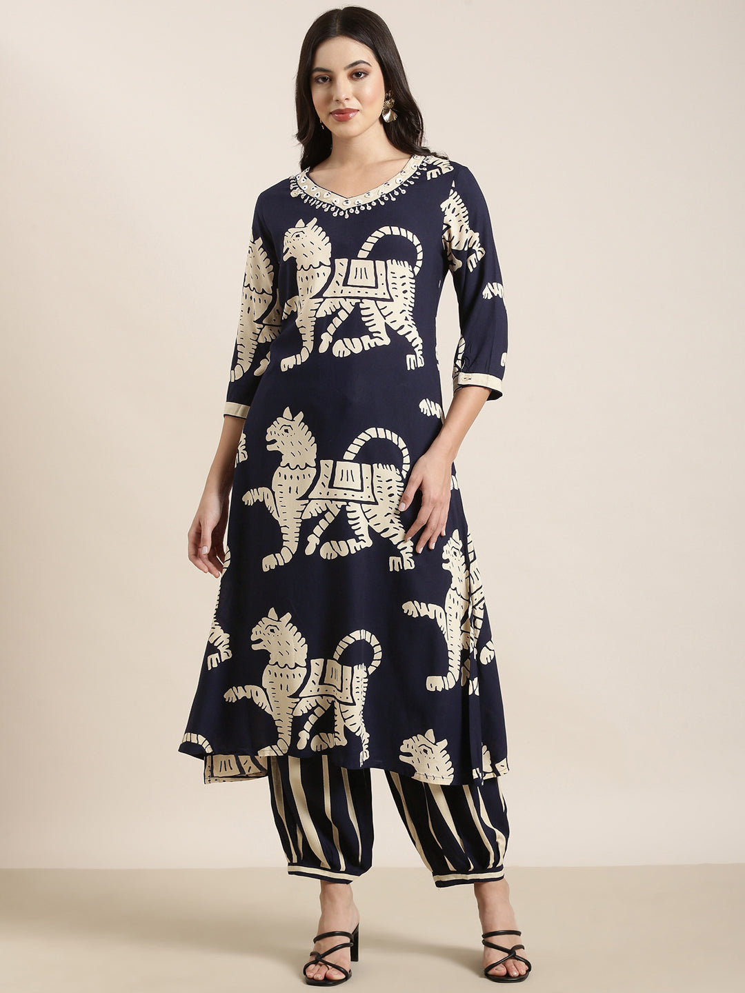 Women Straight Navy Blue Ethnic Motifs Kurta and Trousers Set