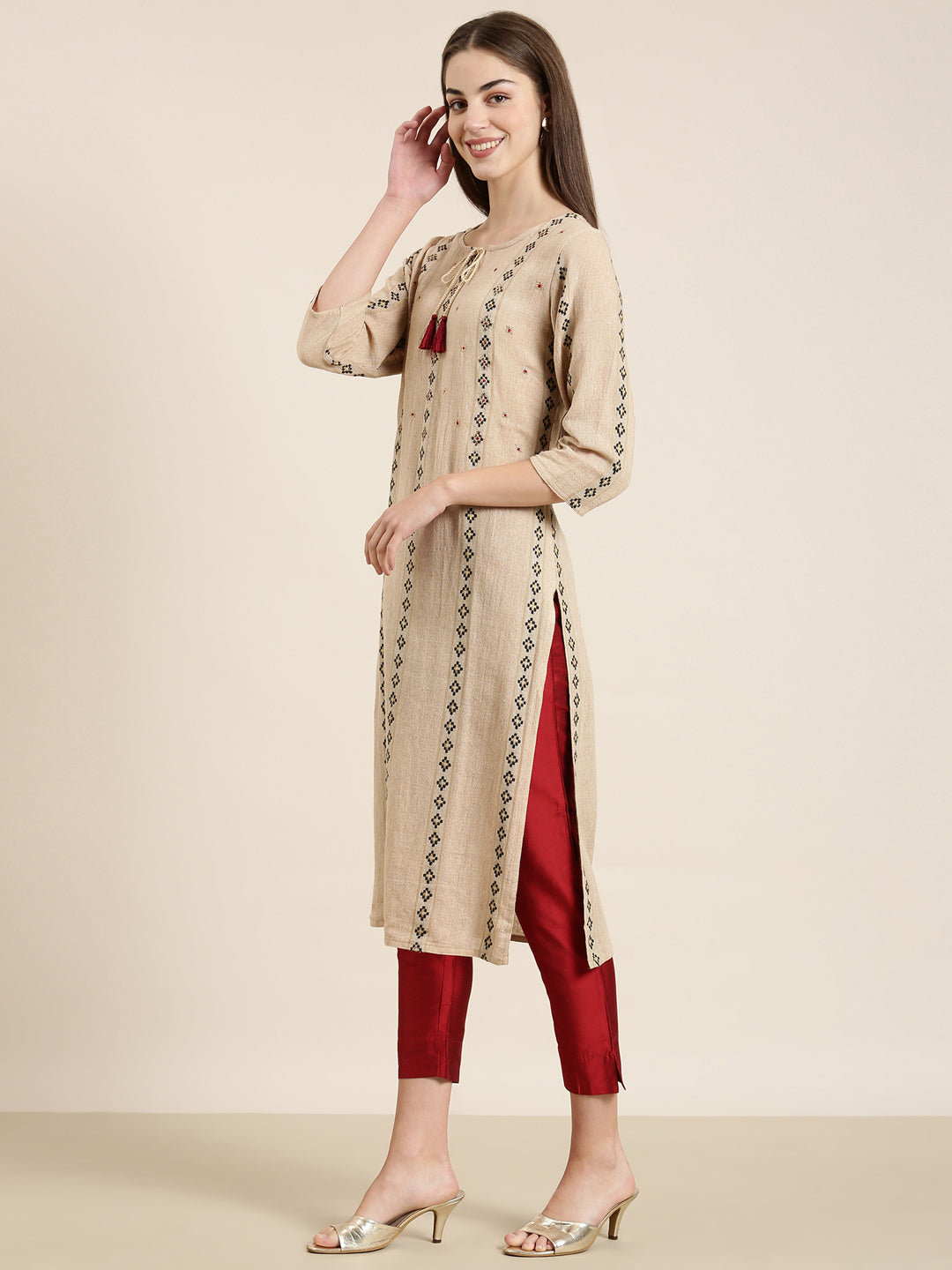 Women Beige Solid Straight Kurta