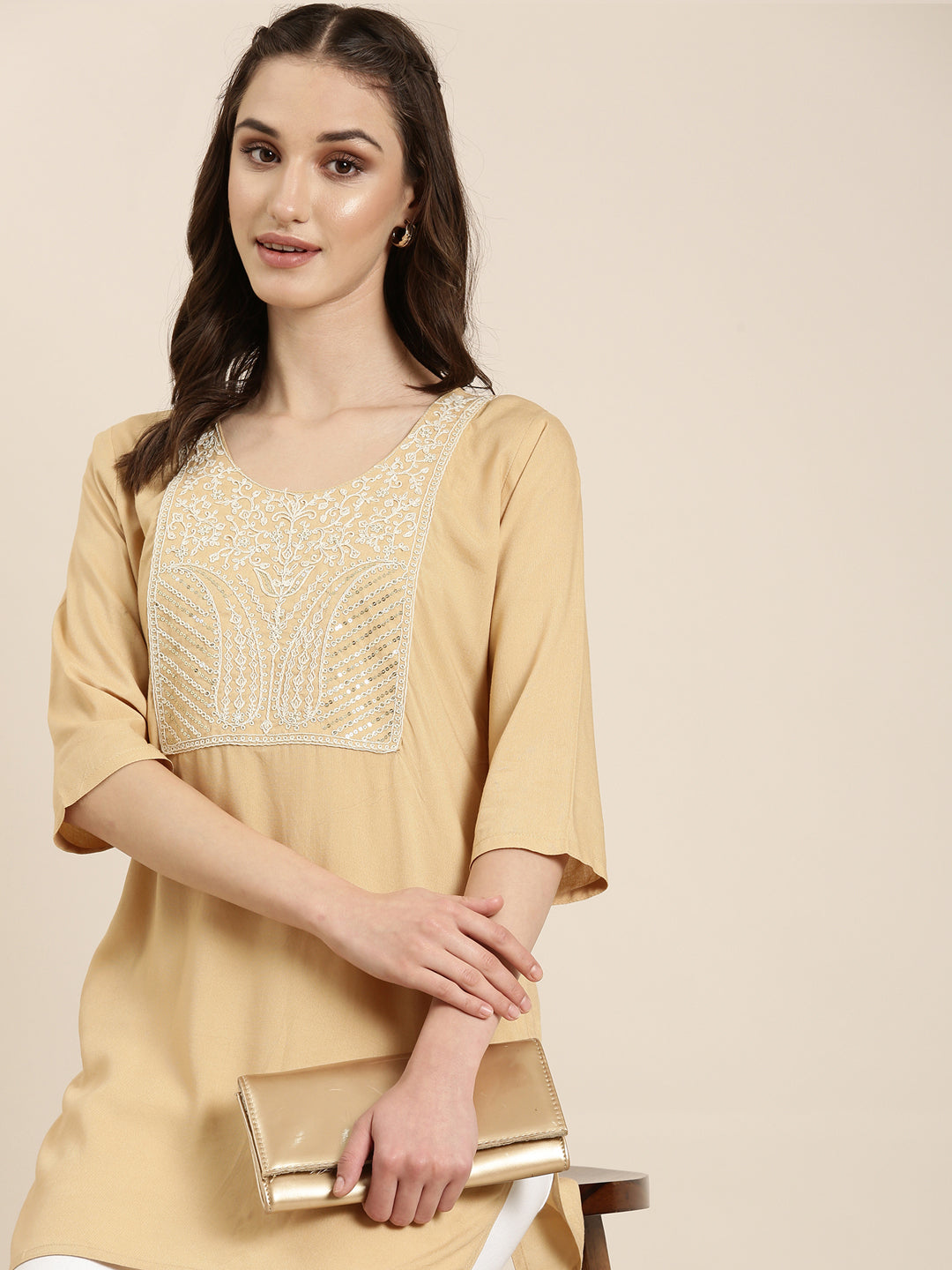 Women Beige Solid Straight Kurti