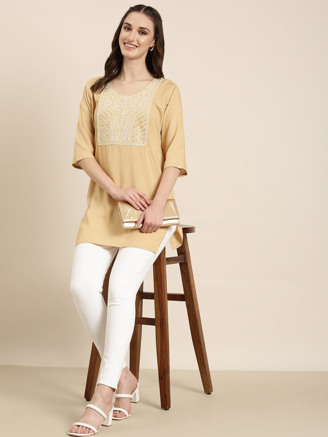 Women Beige Solid Straight Kurti