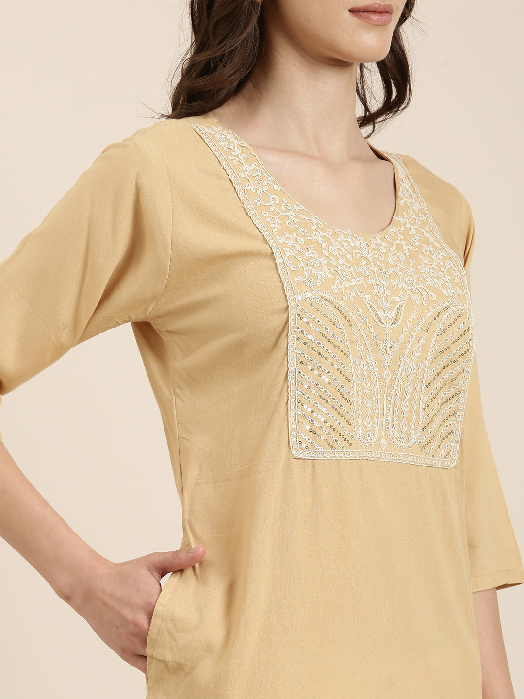 Women Beige Solid Straight Kurti