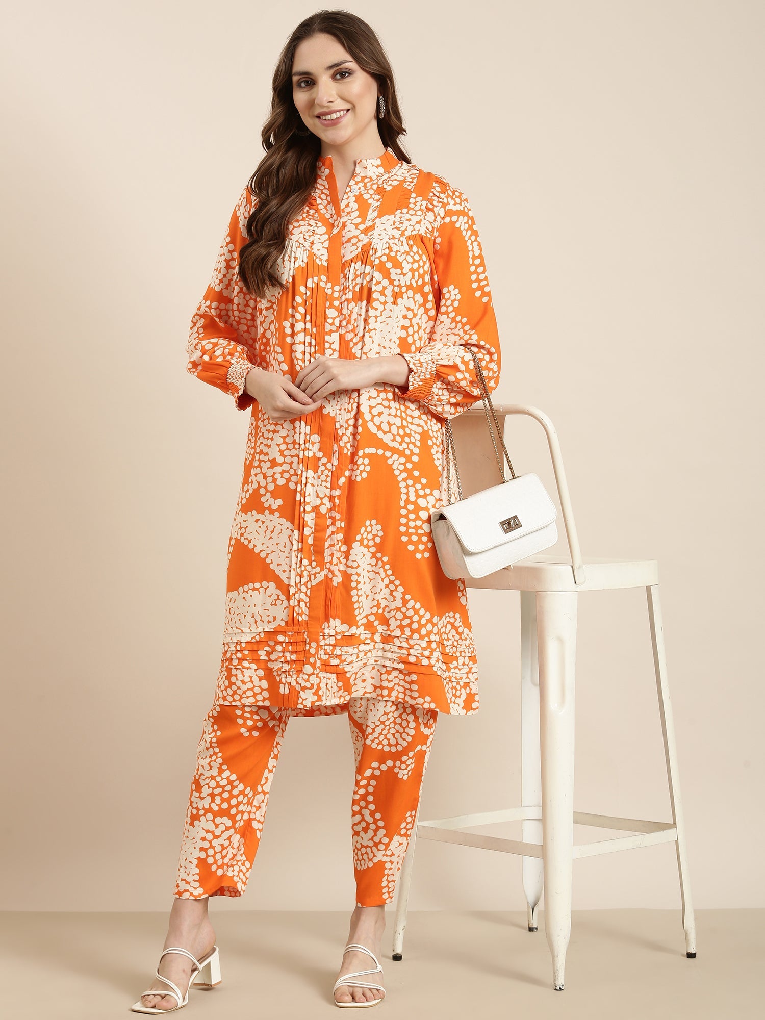 Women A-Line Orange Abstract Kurta and Trousers Set