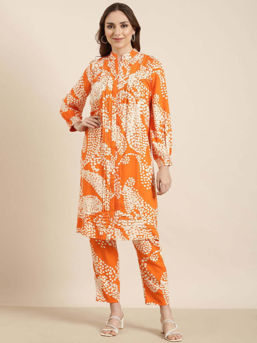 Women A-Line Orange Abstract Kurta and Trousers Set