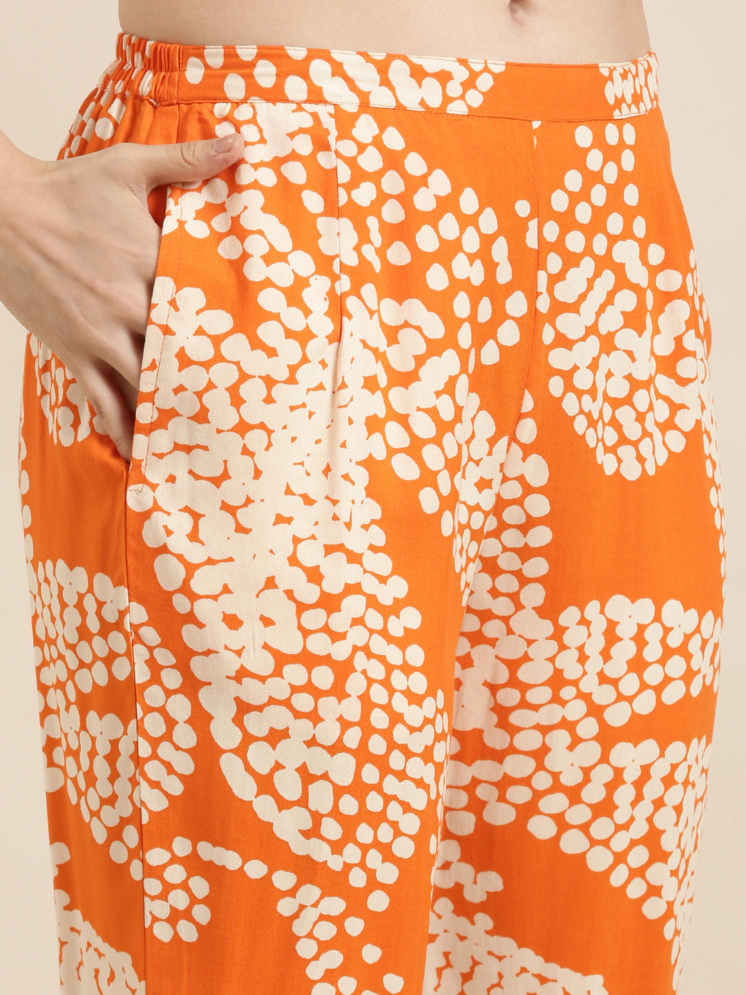 Women A-Line Orange Abstract Kurta and Trousers Set