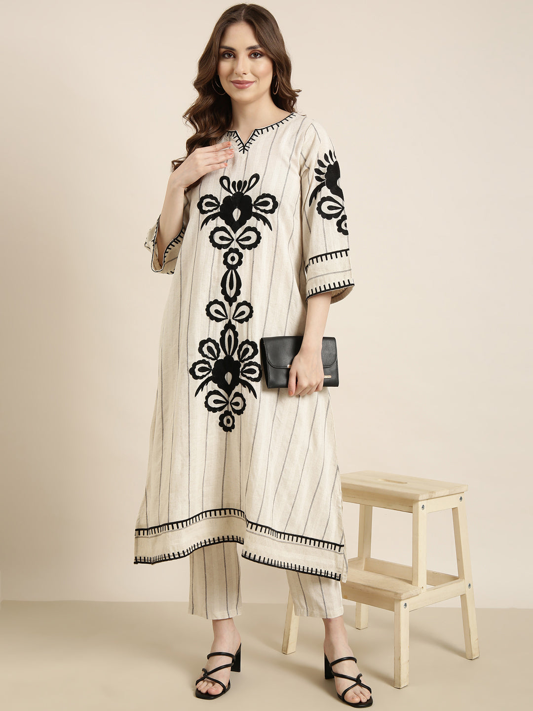 Women A-Line Cream Woven Design Kurta and Trousers Set