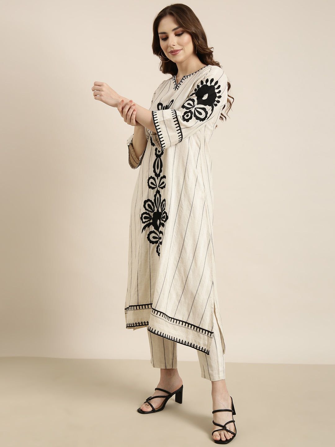 Women A-Line Cream Woven Design Kurta and Trousers Set