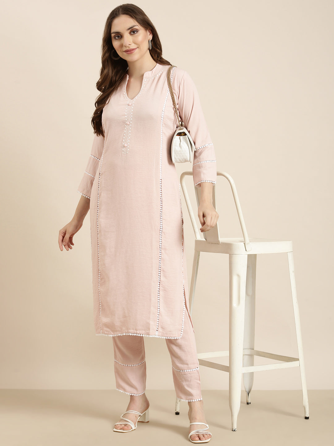 Women Straight Peach Solid Kurta and Trousers Set