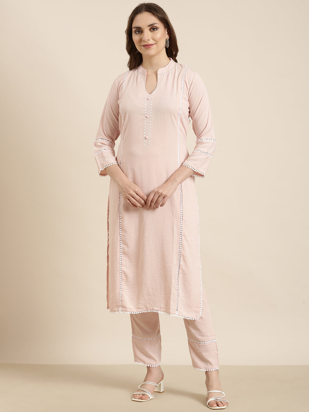 Women Straight Peach Solid Kurta and Trousers Set