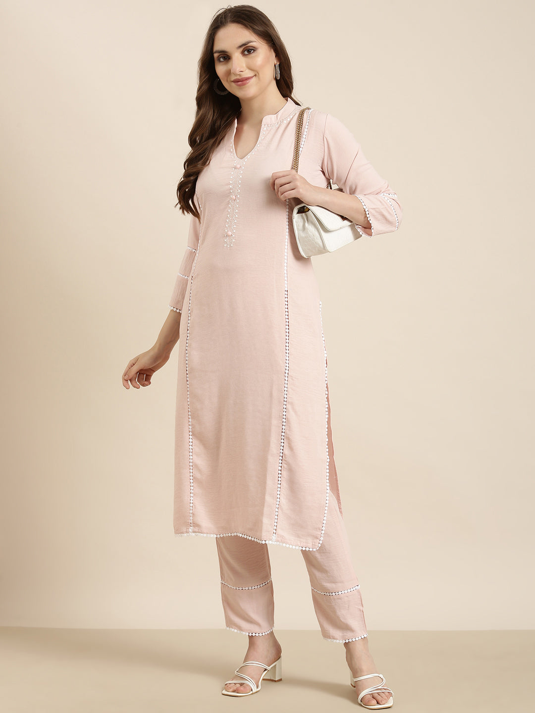 Women Straight Peach Solid Kurta and Trousers Set