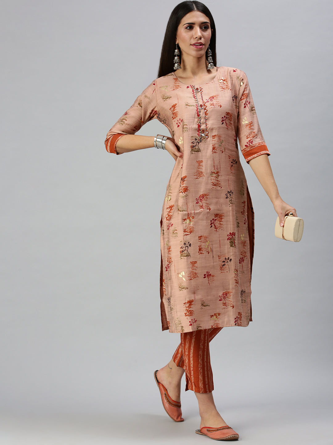 Women's Peach Printed Kurta Sets