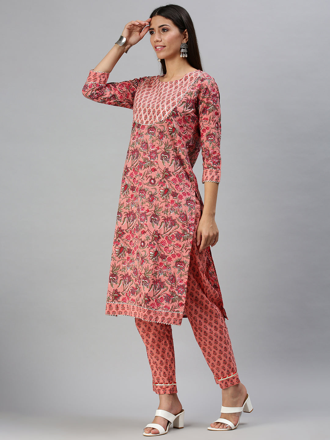 Women's Peach Printed Kurta Sets